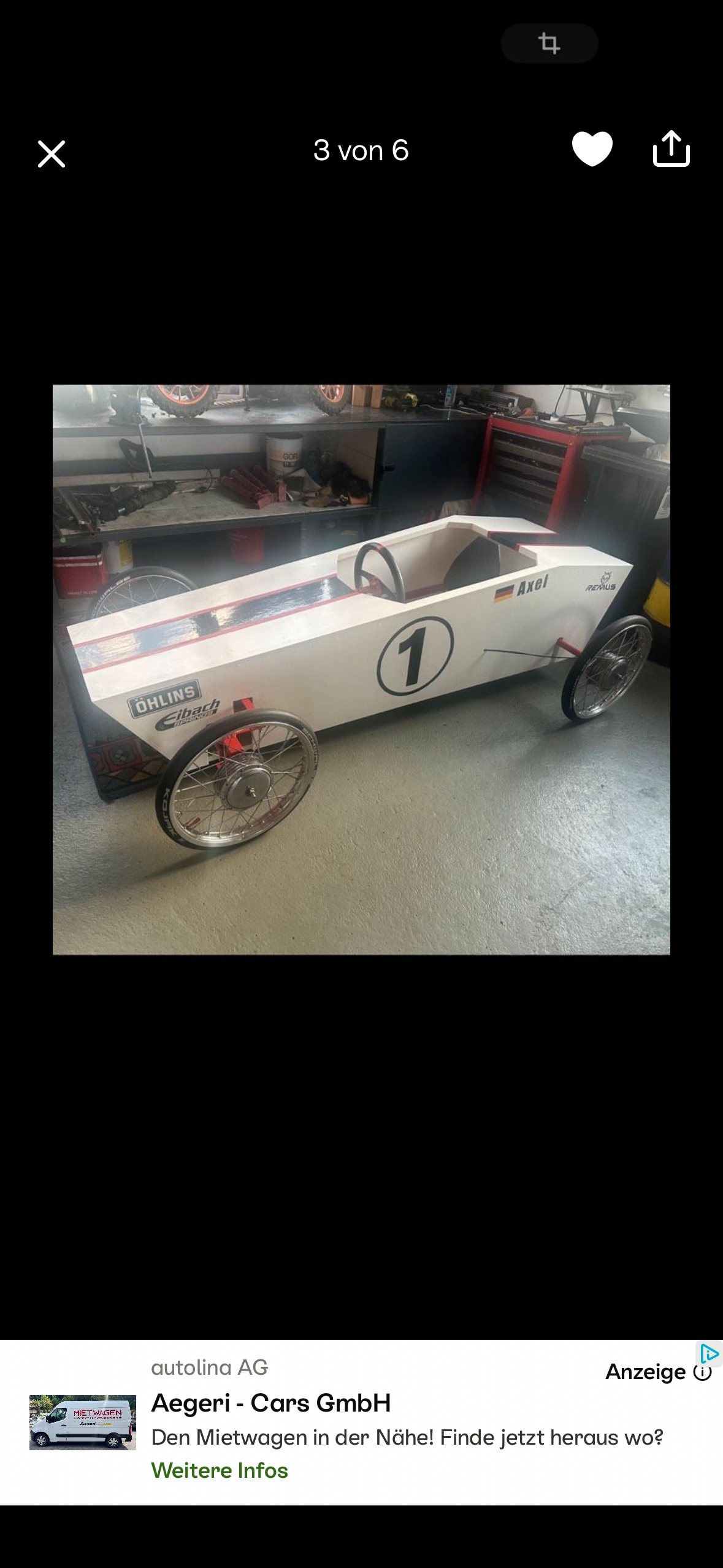 Fjola electric quadricycle in garage
